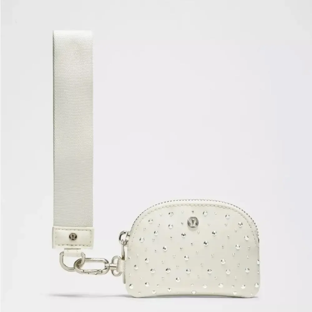 NWT Lululemon Athletica Dual‎ Pouch Wristlet Studded Bone/Silver RARE
